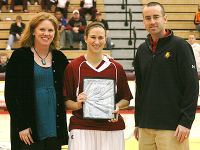 Junior Tricia Principe (center) is honored at a recent home game.  FSU will honor student-athletes for their academic success this Thursday (Photo Courtesy Zeke Jennings - Big Rapids Pioneer)