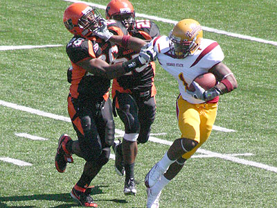 Freshman Alan Freeman is brought down by the Oilers (Photo by Sandy Gholston)