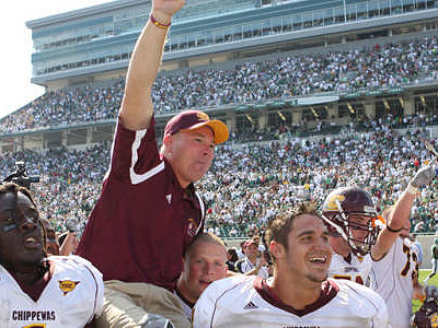 CMU head coach and FSU Alum Butch Jones is hoisted by players after the Chippewas' stunning victory this season at Michigan State (Photo courtesy CMUChippewas.com)