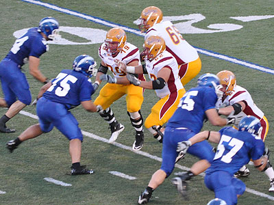 The Bulldog offensive line tries to provide time in Friday's contest (Photo by Rob Bentley)
