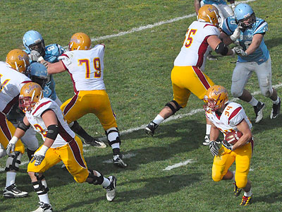 FSU's Skyler Stoker looks for room on a first-half touchdown run for FSU at Northwood (Photo by Rob Bentley)