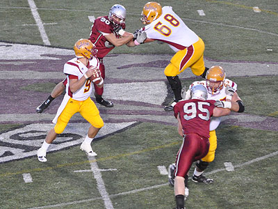 FSU's Tom Schneider looks for a receiver in Saturday's contest at Indianapolis (Photo by Rob Bentley)