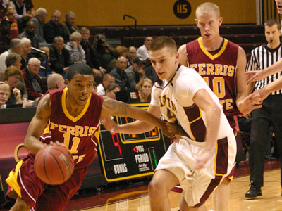 FSU's Darien Gay handles the ball against Calvin (Photo by Sandy Gholston)