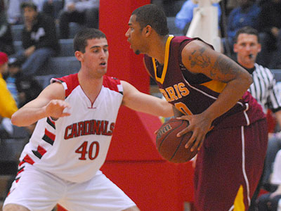 FSU's Justin Keenan works against SVSU's Adam Roberts (Photo by Rob Bentley)