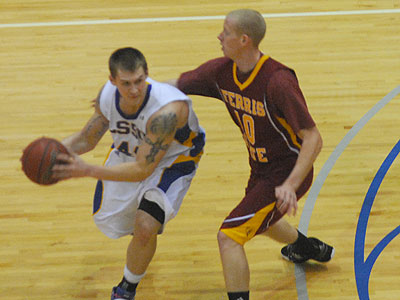 FSU's Austin Randel guards LSSU's Andrew Charlesworth (Photo by Rob Bentley)