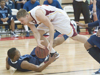 FSU's Jon Yeazel runs over a Northwood player on Thursday (Photo by Ed Hyde)