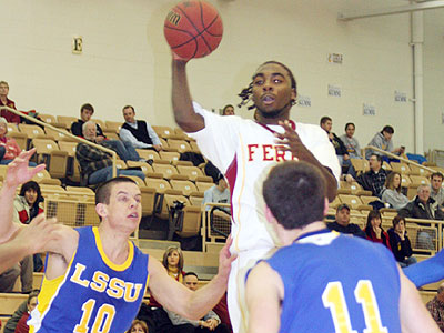 The Bulldogs' Josh Young soars with the ball in Thursday's game (Pioneer Photo)