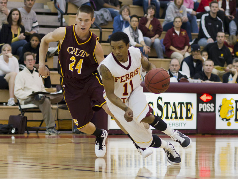 Ferris' Darien Gay drives against Calvin (Photo by Ben Amato)