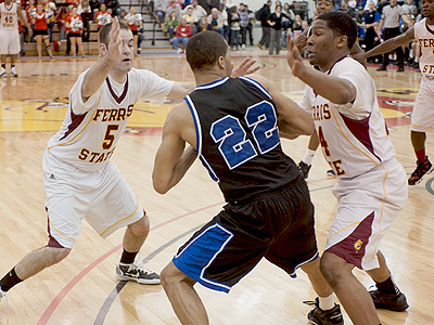 The Bulldogs' Matt DeHart and Daniel Sutherlin trap the ball against GVSU (Photo by Ed Hyde)