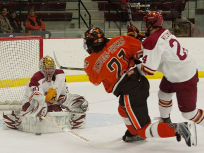 Pat Nagle makes one of his 29 saves in Saturday's series finale decision over Bowling Green State. (Photo by Scott Whitney)