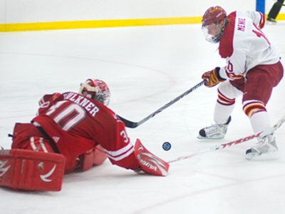 Ferris' Justin Menke tries to score on Nebraska-Omaha goaltender John Faulkner in Friday's matchup.  (Photo by Ed Hyde)