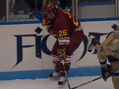 Junior forward Mike Embach recorded his second goal of the series at Notre Dame in Sunday's matchup.  (Photo by Joe Gorby)