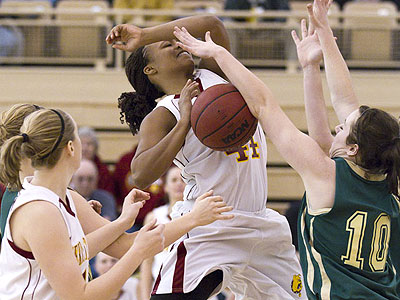 Ferris senior Tiara Adams battles in Thursday's conference opener (Photo by Ben Amato)