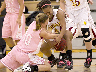 Ferris State senior Tiara Adams battles for the ball in the game versus Wayne State (Photo by Ben Amato)