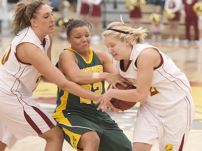 FSU's Andrea Clancy & Sarah DeShone battle for the ball against NMU (Photo by Ed Hyde, FSU Photo Services)
