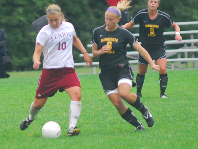 Bri Borgman and the Bulldogs come up just short in  Friday's 2010 season opener.  (Photo by Joe Gorby)