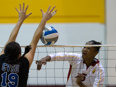 Arielle Goodson hammers one of her match-high 16 kills against Grand Valley State in Friday's home match.  (Photo by Ben Amato)